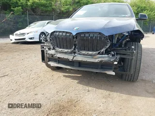 2023 BMW X6 xDrive40i z VIN 5UXCY6C07P9P85707, wystawiony jako IAAI lot #42075043 z przebiegiem 25 218 mil mil oraz . Historia ofert i sprzedaży dostępna na DreamBid. Obrazek 6.