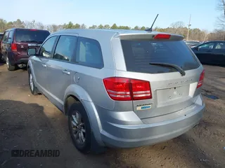 2014 Dodge Journey SE with VIN 3C4PDCAB1ET247218, listed as a IAAI auction lot 41760408 with 148,591 mi miles and . Bid and sale history available at carsss.com. Image 3.