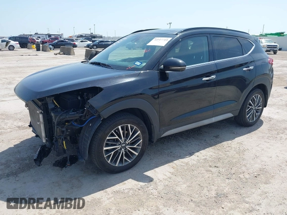 2021 Hyundai Tucson Ultimate with VIN KM8J33ALXMU289579, listed as a IAAI auction lot 42027719 with 95,989 mi miles and . Bid and sale history available at DreamBid. Image 2.