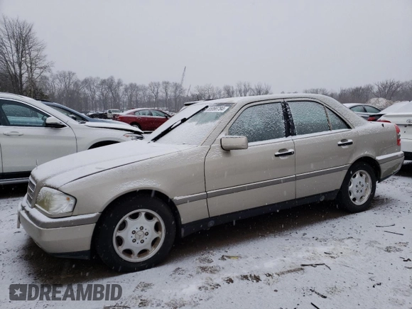 1994 Mercedes-Benz C with VIN WDBHA28E6RF015428, listed as a Copart auction lot 85866784 with Not Provided miles and Salvage Title. Bid and sale history available at carsss.com. Image 1.
