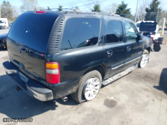 2000 Chevrolet New Tahoe LT with VIN 1GNEK13TXYJ191872, listed as a IAAI auction lot 41860033 with 1 mi miles. Bid and sale history available at carsss.com. Image 4.