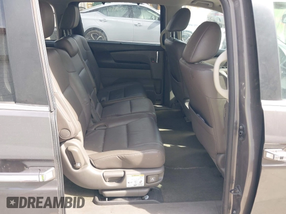 2014 Honda Odyssey EX-L with VIN 5FNRL5H67EB106183, listed as a IAAI auction lot 42210600 with 196,166 mi miles and . Bid and sale history available at DreamBid. Image 8.