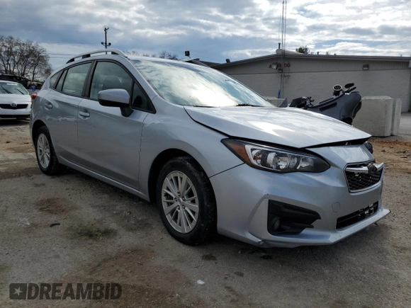2018 Subaru Impreza Premium with VIN 4S3GTAD66J3724009, listed as a Copart auction lot 64833942 with 105,862 mi miles. Bid and sale history available at carsss.com. Image 1.