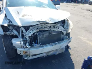 2009 Toyota Yaris z VIN JTDBT903994054689, wystawiony jako IAAI lot #39914448 z przebiegiem 138 255 mil mil oraz . Historia ofert i sprzedaży dostępna na DreamBid. Obrazek 6.