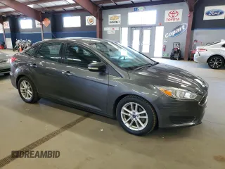 2015 Ford Focus SE with VIN 1FADP3F2XFL249619, listed as a Copart auction lot 63705825 with 118,573 mi miles and Clean title. Bid and sale history available at DreamBid. Image 4.