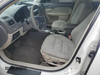 2010 Ford Fusion SE z VIN 3FAHP0HA9AR306505, wystawiony jako Copart lot #55057295 z przebiegiem 214 141 mil mil oraz Nie do naprawy • Non repairable. Historia ofert i sprzedaży dostępna na DreamBid. Obrazek 7.