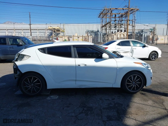 2015 Hyundai Veloster with VIN KMHTC6AD3FU227852, listed as a IAAI auction lot 41657406 with 179,185 mi miles. Bid and sale history available at carsss.com. Image 14.