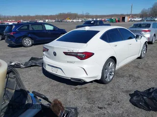 2021 Acura TLX Technology z VIN 19UUB6F41MA006805, wystawiony jako IAAI lot #41869747 z przebiegiem 59 228 mil mil oraz . Historia ofert i sprzedaży dostępna na DreamBid. Obrazek 4.