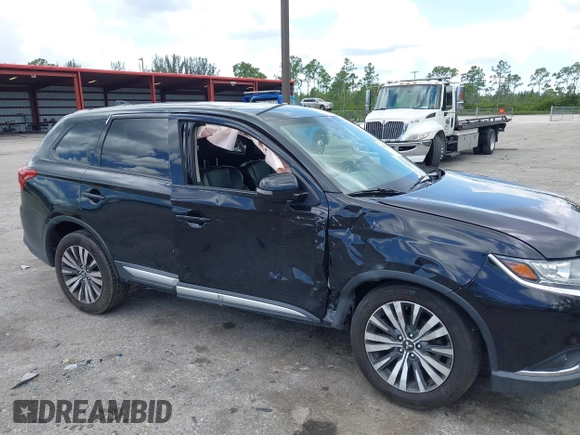2019 Mitsubishi Outlander ES with VIN JA4AZ3A36KZ049555, listed as a IAAI auction lot 42567525 with 170,346 mi miles and . Bid and sale history available at DreamBid. Image 6.