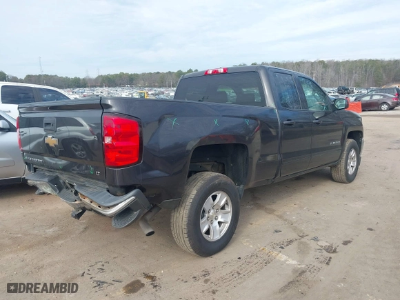 2016 Chevrolet Silverado 1500 LT with VIN 1GCRCREC0GZ232755, listed as a IAAI auction lot 41459604 with 131,600 mi miles. Bid and sale history available at carsss.com. Image 4.