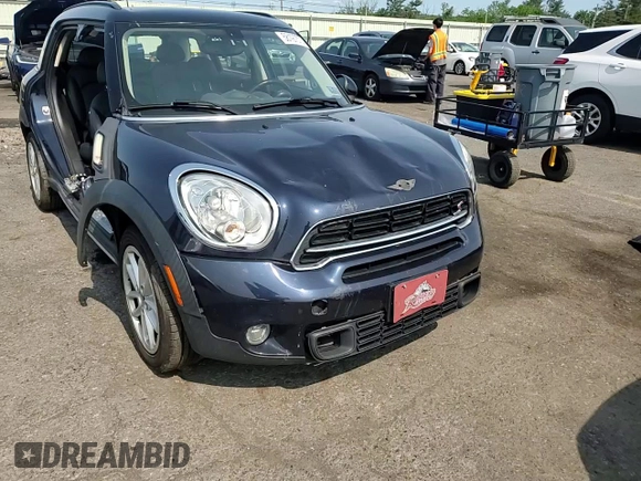 2015 MINI Countryman S z VIN WMWZC5C54FWP48739, wystawiony jako Copart lot #58197575 z przebiegiem 119 816 mil mil oraz Szkoda całkowita • Salvage title. Historia ofert i sprzedaży dostępna na DreamBid. Obrazek 14.