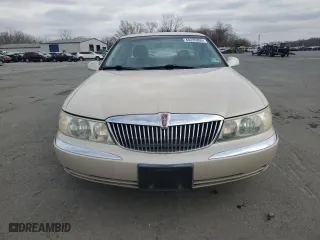 2001 Lincoln Continental with VIN 1LNHM97V71Y711352, listed as a Copart auction lot 46235305 with 122,786 mi miles and Salvage Title. Bid and sale history available at carsss.com. Image 5.