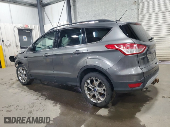 2014 Ford Escape SE with VIN 1FMCU9G96EUE53240, listed as a Copart auction lot 51920455 with 180,948 mi miles and Salvage Title. Bid and sale history available at DreamBid. Image 2.