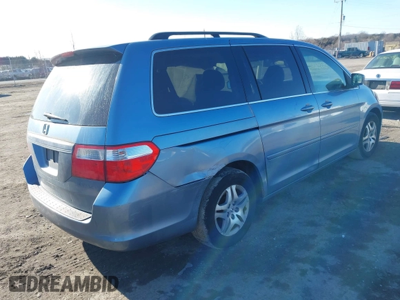 2005 Honda Odyssey EX-L with VIN 5FNRL38765B076591, listed as a IAAI auction lot 41624354 with 172,698 mi miles and . Bid and sale history available at DreamBid. Image 4.