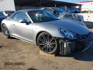 2019 Porsche 911 Carrera with VIN WP0CA2A92KS129254, listed as a IAAI auction lot 41392032 with 26,153 mi miles. Bid and sale history available at carsss.com. Image 1.