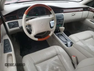 2001 Cadillac Eldorado ESC z VIN 1G6EL12Y61B107519, wystawiony jako Copart lot #38051744 z przebiegiem 52 018 mil mil oraz Czysty tytuł • Clean title. Historia ofert i sprzedaży dostępna na DreamBid. Obrazek 8.