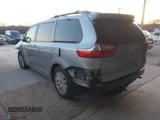 2016 Toyota Sienna LE with VIN 5TDJK3DC4GS133694, listed as a IAAI auction lot 41171171 with 99,680 mi miles. Bid and sale history available at carsss.com. Image 3.