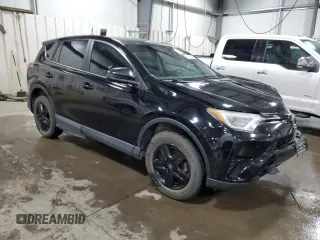 2018 Toyota RAV4 LE with VIN 2T3BFREV6JW763007, listed as a Copart auction lot 58604545 with 107,683 mi miles and Salvage title. Bid and sale history available at DreamBid. Image 4.