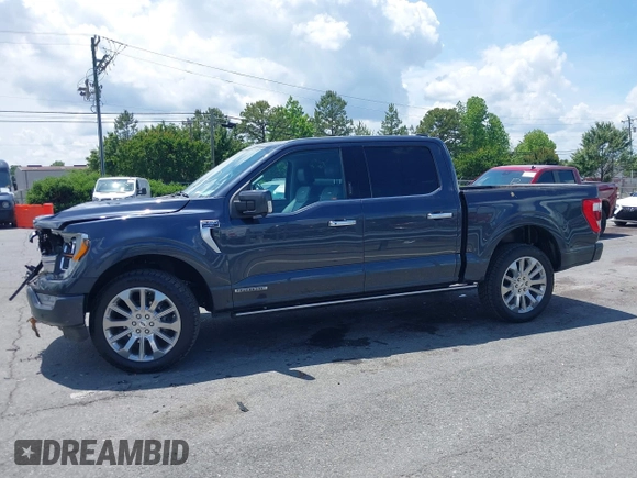2021 Ford F-150 XL z VIN 1FTFW1ED5MFA85060, wystawiony jako IAAI lot #42240727 z przebiegiem 150 378 mil mil oraz . Historia ofert i sprzedaży dostępna na DreamBid. Obrazek 14.