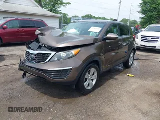 2012 Kia Sportage LX z VIN KNDPB3A20C7290990, wystawiony jako IAAI lot #42264420 z przebiegiem 87 994 mil mil oraz . Historia ofert i sprzedaży dostępna na DreamBid. Obrazek 2.
