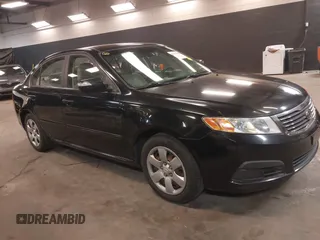 2010 Kia Optima LX z VIN KNAGG4A88A5425859, wystawiony jako IAAI lot #42286284 z przebiegiem 141 079 mil mil oraz . Historia ofert i sprzedaży dostępna na DreamBid. Obrazek 1.