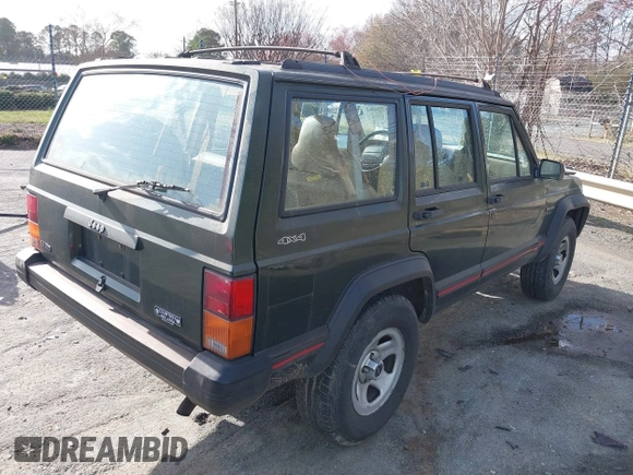 1996 Jeep Cherokee Sport with VIN 1J4FJ68S1TL204870, listed as a IAAI auction lot 41726962 with 93,462 mi miles. Bid and sale history available at carsss.com. Image 4.