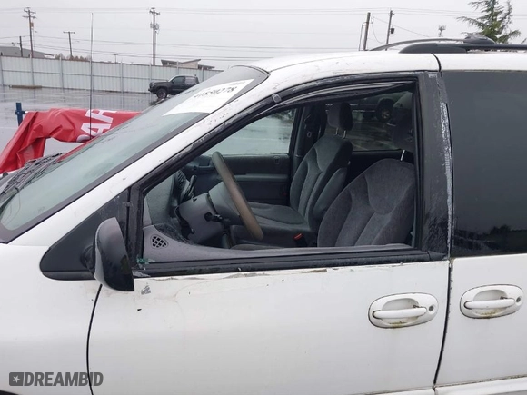 1999 Dodge Caravan SE with VIN 2B4GP44GXXR285795, listed as a IAAI auction lot 41850278 with 2,552,594 mi miles. Bid and sale history available at carsss.com. Image 6.