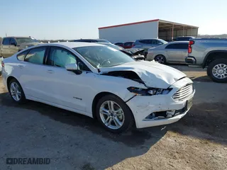 2018 Ford Fusion Hybrid SE with VIN 3FA6P0LU7JR188124, listed as a IAAI auction lot 41760184 with 74,731 mi miles. Bid and sale history available at carsss.com. Image 1.