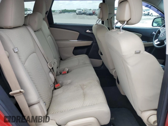 2017 Dodge Journey SXT z VIN 3C4PDCBB9HT697041, wystawiony jako Copart lot #56941895 z przebiegiem 137 474 mil mil oraz Szkoda całkowita • Salvage title. Historia ofert i sprzedaży dostępna na DreamBid. Obrazek 11.