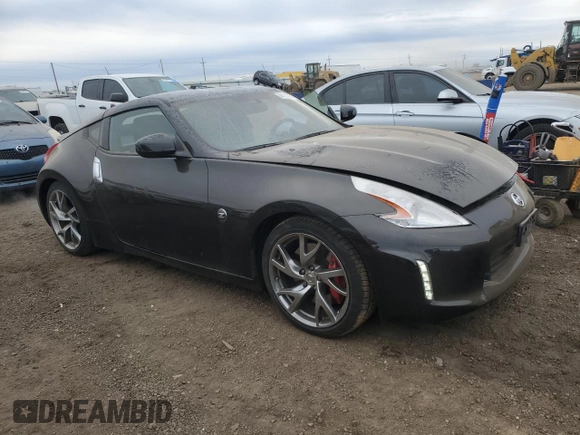 2014 Nissan 370Z Touring with VIN JN1AZ4EH2EM633814, listed as a Copart auction lot 84120274 with 22,979 mi miles and Salvage Title. Bid and sale history available at carsss.com. Image 4.