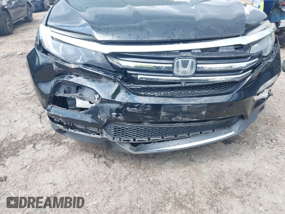 2017 Honda Pilot Touring with VIN 5FNYF5H99HB037126, listed as a IAAI auction lot 42275048 with 164,289 mi miles and . Bid and sale history available at DreamBid. Image 6.
