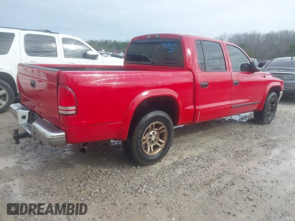 2004 Dodge Dakota SLT with VIN 1D7HL48N44S708625, listed as a IAAI auction lot 41552527 with 337,535 mi miles. Bid and sale history available at carsss.com. Image 4.