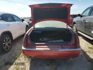 2000 Cadillac Eldorado z VIN 1G6EL12Y7YU198685, wystawiony jako Copart lot #75093094 z przebiegiem Nie podano mil oraz Szkody całkowita. Historia ofert i sprzedaży dostępna na DreamBid. Obrazek 6.