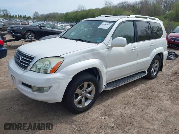 2004 Lexus GX 470 with VIN JTJBT20X440062559, listed as a IAAI auction lot 42142442 with 261,126 mi miles. Bid and sale history available at carsss.com. Image 2.
