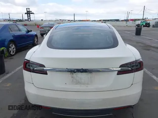 2014 Tesla Model S 60 with VIN 5YJSA1H14EFP34738, listed as a IAAI auction lot 42132117 with 120,898 mi miles and . Bid and sale history available at DreamBid. Image 16.