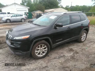 2014 Jeep Cherokee Latitude with VIN 1C4PJLCB1EW231178, listed as a IAAI auction lot 42128894 with 121,412 mi miles. Bid and sale history available at carsss.com. Image 2.