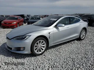 2016 Tesla Model S 90D with VIN 5YJSA1E25GF142104, listed as a Copart auction lot 50874815 with 84,917 mi miles and Salvage Title. Bid and sale history available at DreamBid. Image 1.