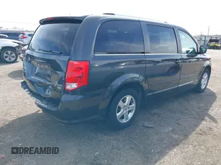 2011 Dodge Grand Caravan Crew with VIN 2D4RN5DG3BR660235, listed as a IAAI auction lot 41945522 with 148,924 mi miles and . Bid and sale history available at DreamBid. Image 4.