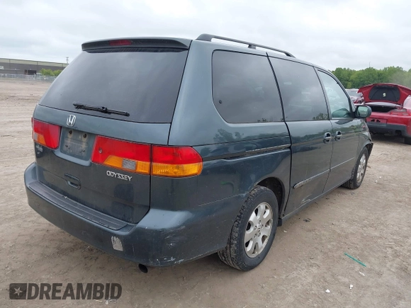 2003 Honda Odyssey EX-L z VIN 5FNRL18053B133092, wystawiony jako IAAI lot #42365081 z przebiegiem 239 753 mil mil oraz . Historia ofert i sprzedaży dostępna na DreamBid. Obrazek 4.