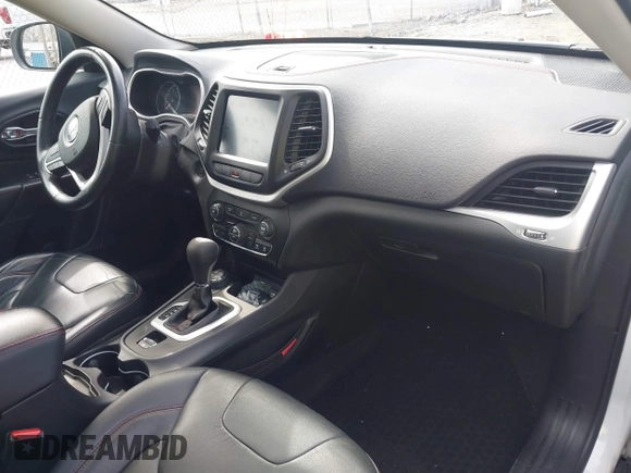 2014 Jeep Cherokee Trailhawk with VIN 1C4PJMBS5EW240375, listed as a IAAI auction lot 41806725 with 127,705 mi miles. Bid and sale history available at carsss.com. Image 5.