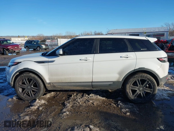 2015 Land Rover Range Rover Evoque Pure Plus with VIN SALVP2BG7FH991529, listed as a IAAI auction lot 41647483 with 76,406 mi miles and . Bid and sale history available at DreamBid. Image 14.