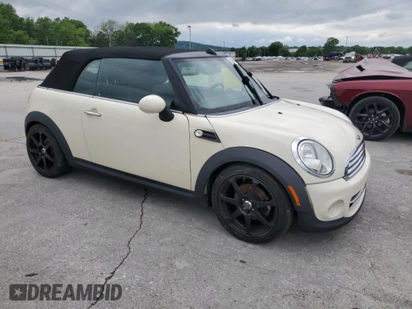 2012 MINI Convertible with VIN WMWZN3C57CT134585, listed as a Copart auction lot 55468995 with 145,645 mi miles and Clean title. Bid and sale history available at DreamBid. Image 4.