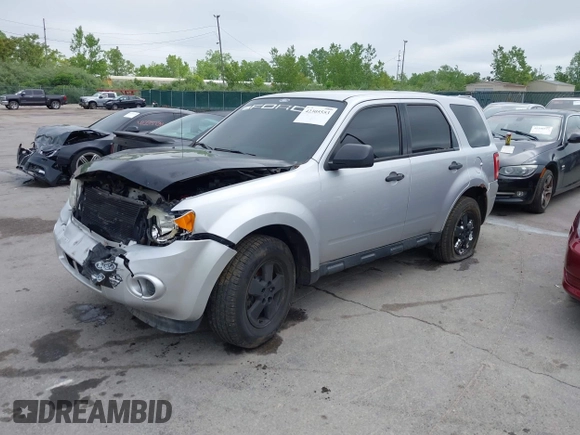 2012 Ford Escape XLS with VIN 1FMCU0C74CKB50787, listed as a IAAI auction lot 42305553 with 167,212 mi miles and . Bid and sale history available at DreamBid. Image 2.