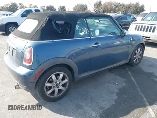 2010 MINI Convertible with VIN WMWMR3C53ATU97865, listed as a IAAI auction lot 41610670 with 154,457 mi miles and . Bid and sale history available at DreamBid. Image 4.