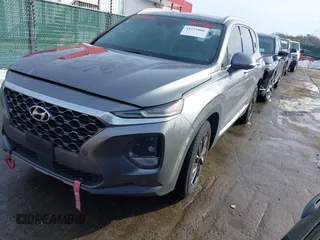 2019 Hyundai Santa Fe Limited with VIN 5NMS5CAD2KH059843, listed as a IAAI auction lot 41271006 with 187,468 mi miles. Bid and sale history available at carsss.com. Image 2.