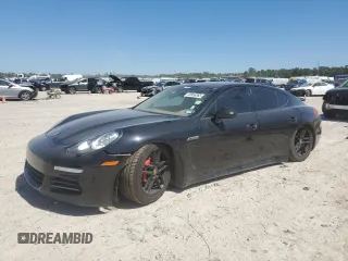 2015 Porsche Panamera S E-Hybrid z VIN WP0AD2A74FL040718, wystawiony jako Copart lot #48956365 z przebiegiem 69 408 mil mil oraz Szkody całkowita. Historia ofert i sprzedaży dostępna na DreamBid. Obrazek 1.
