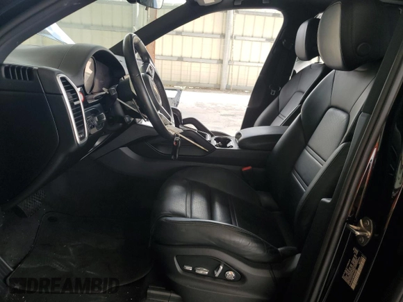 2021 Porsche Cayenne z VIN WP1AA2AY0MDA06430, wystawiony jako Copart lot #51603065 z przebiegiem 26 087 mil mil oraz Szkoda całkowita • Salvage title. Historia ofert i sprzedaży dostępna na DreamBid. Obrazek 7.