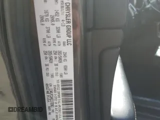 2014 Jeep Grand Cherokee Overland with VIN 1C4RJFCG4EC172361, listed as a Copart auction lot 49053155 with 144,916 mi miles and Salvage Title. Bid and sale history available at DreamBid. Image 14.