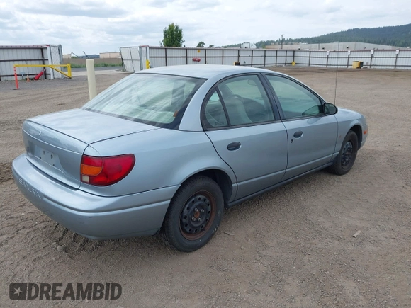 2002 Saturn SL z VIN 1G8ZS52842Z289815, wystawiony jako IAAI lot #42557607 z przebiegiem 184 671 mil mil oraz . Historia ofert i sprzedaży dostępna na DreamBid. Obrazek 4.