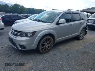 2014 Dodge Journey R/T with VIN 3C4PDDEG7ET139410, listed as a IAAI auction lot 42808542 with 185,712 mi miles and . Bid and sale history available at DreamBid. Image 2.